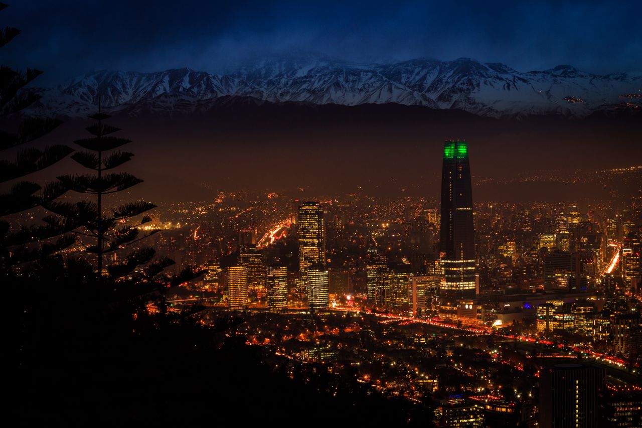 Beautiful night view of Santiago's skyline with the Andes mountains in the background.